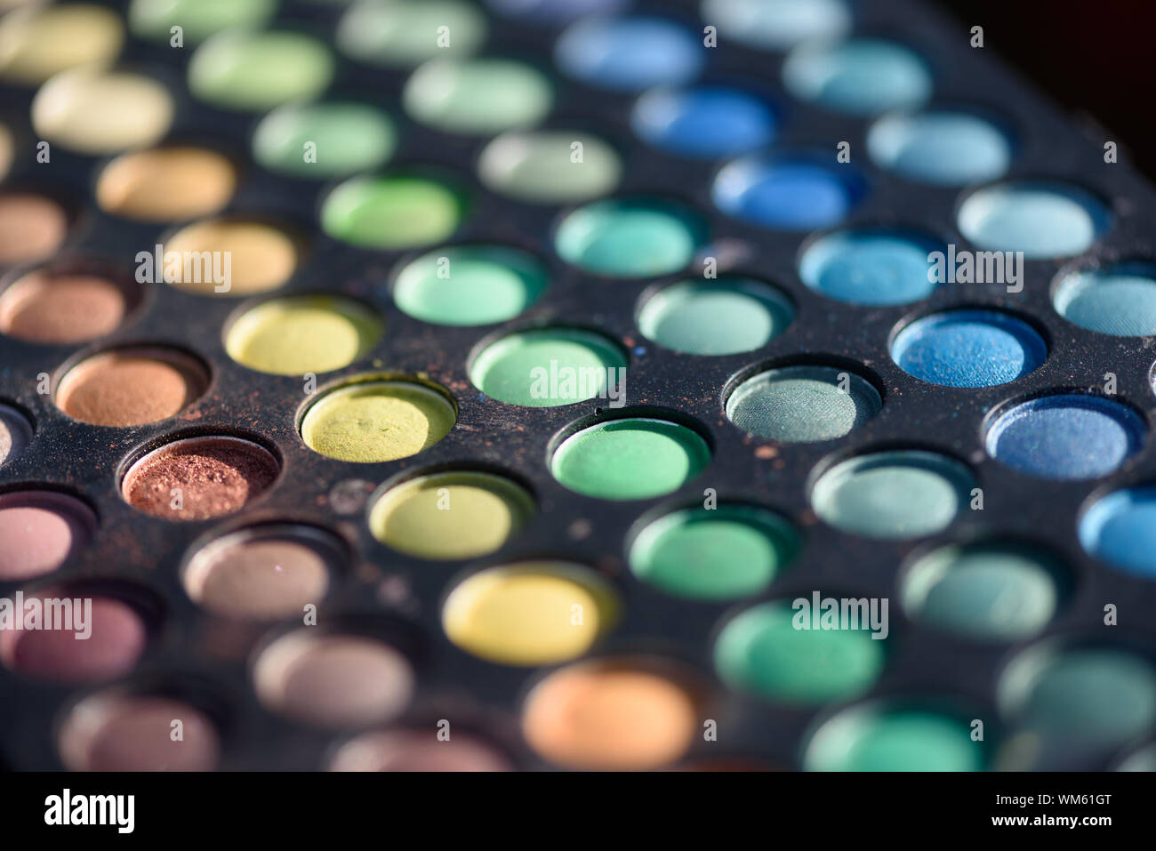 Closeup macro of paints used for makeup and face painting with different colours Stock Photo