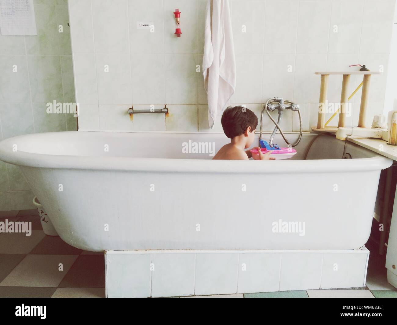 toy boat in bathtub