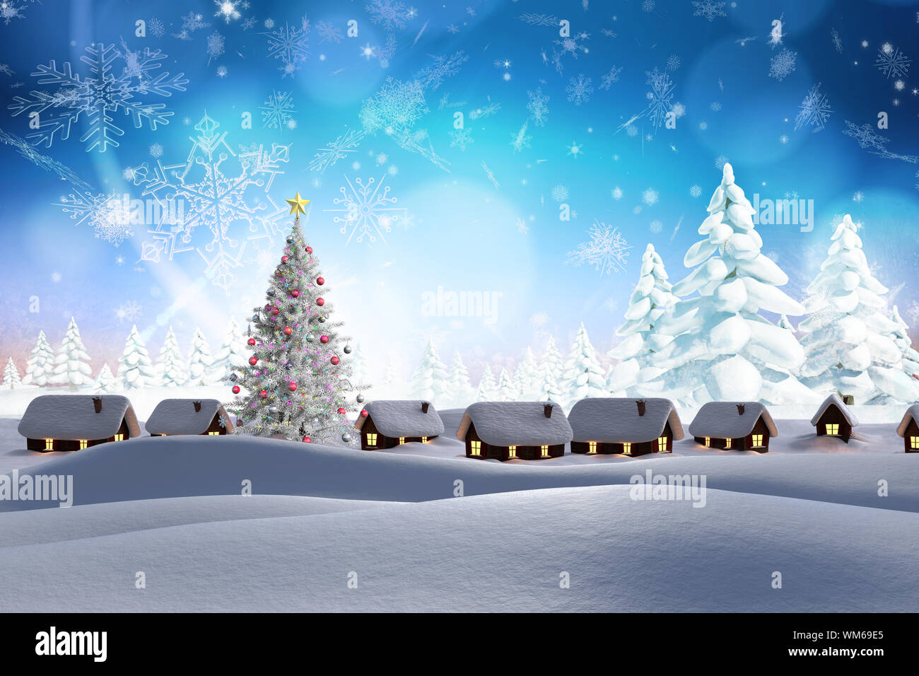 Snow covered village against snowy landscape with fir trees Stock Photo ...