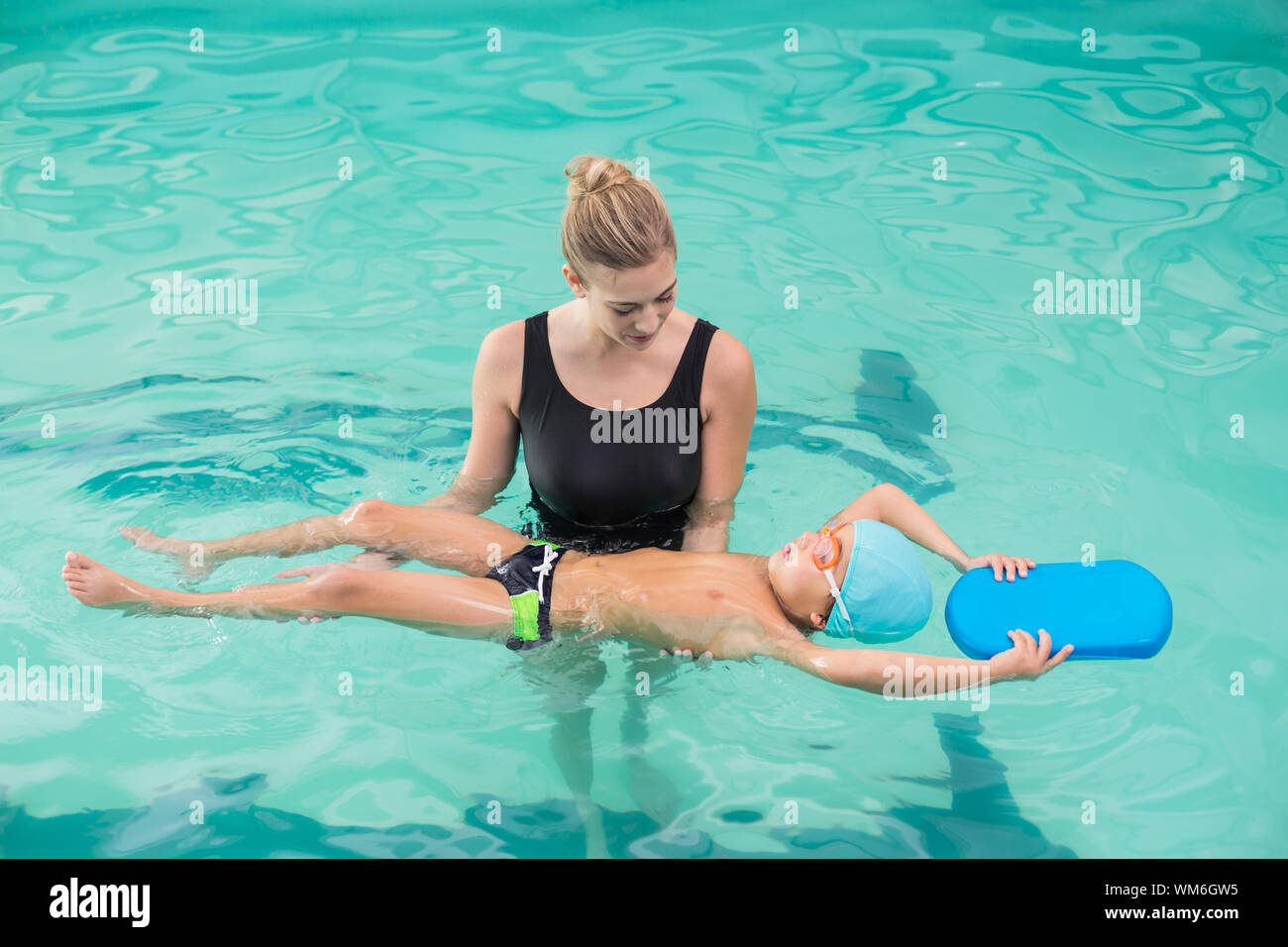 little boy swimming