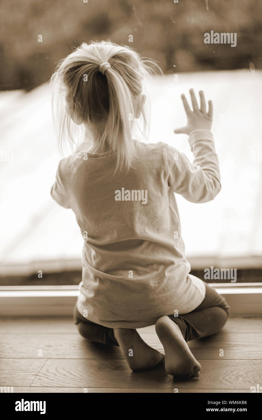 Rear View Girl Kneeling On High Resolution Stock Photography and Images ...