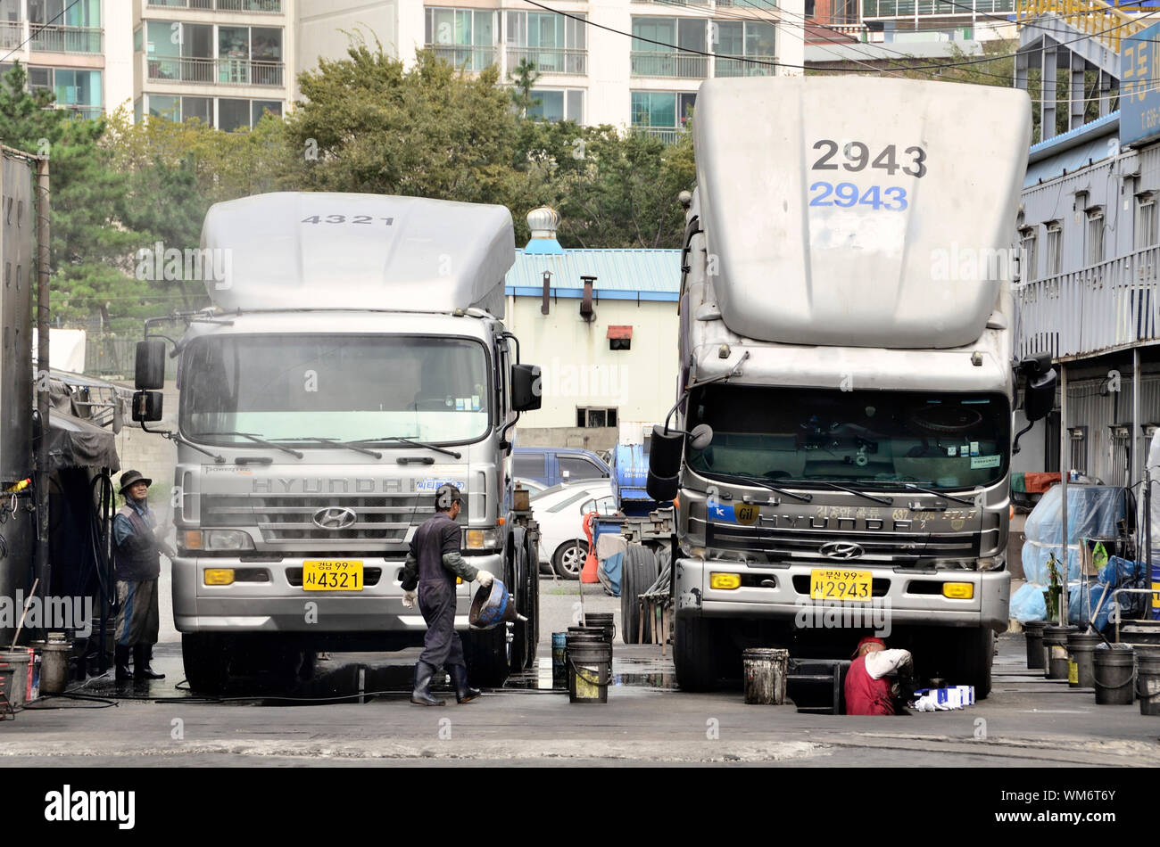 A truck wash station on the outskirts of Busan Port, Korea Stock Photo