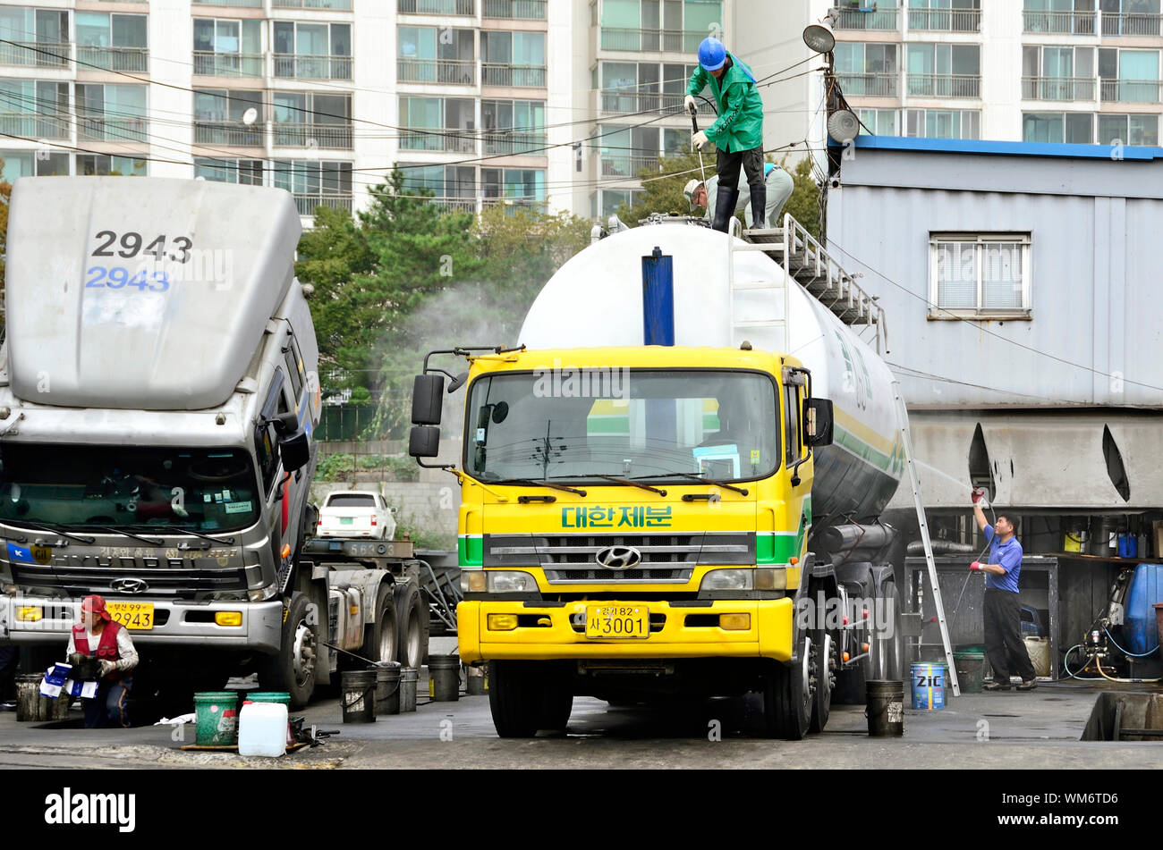 A truck wash station on the outskirts of Busan Port, Korea Stock Photo