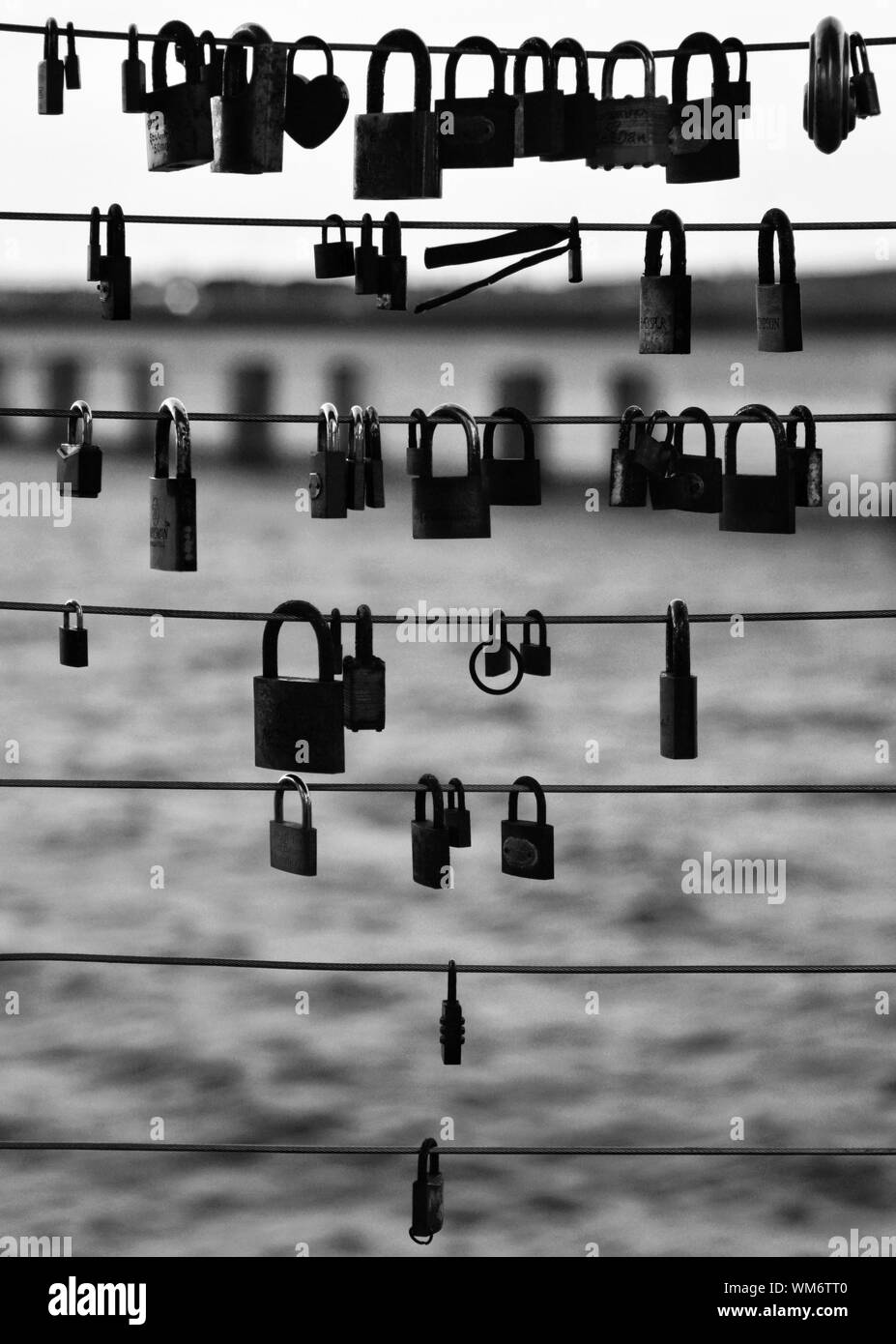 Padlocks attached to railing Black and White Stock Photos & Images Alamy