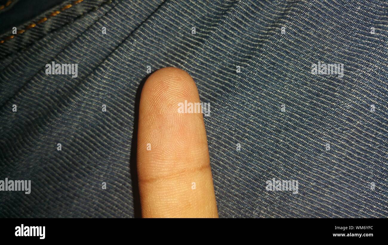 Close-up Of Human Finger Stock Photo
