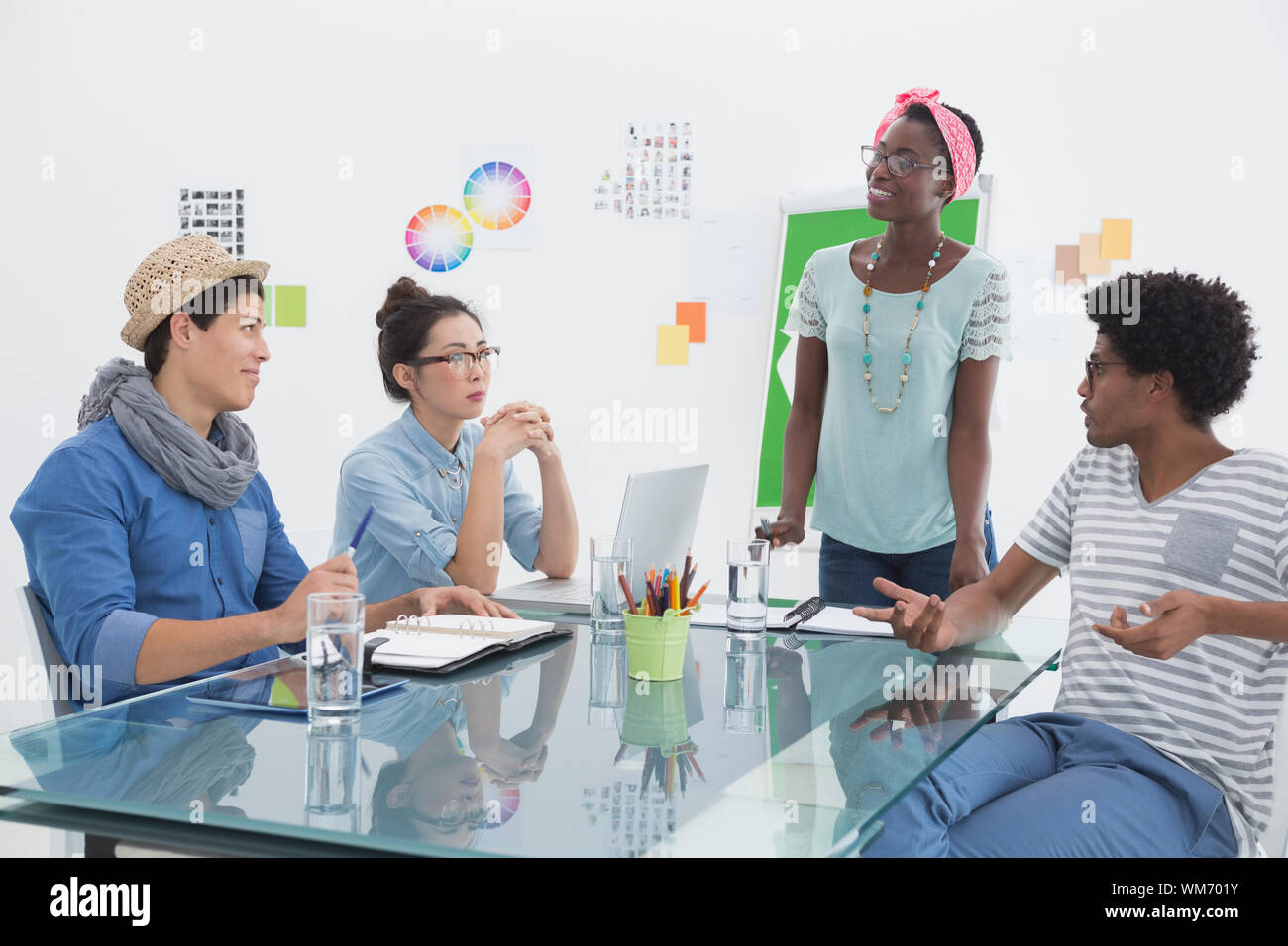 Young creative team having a meeting about recycling in creative office Stock Photo