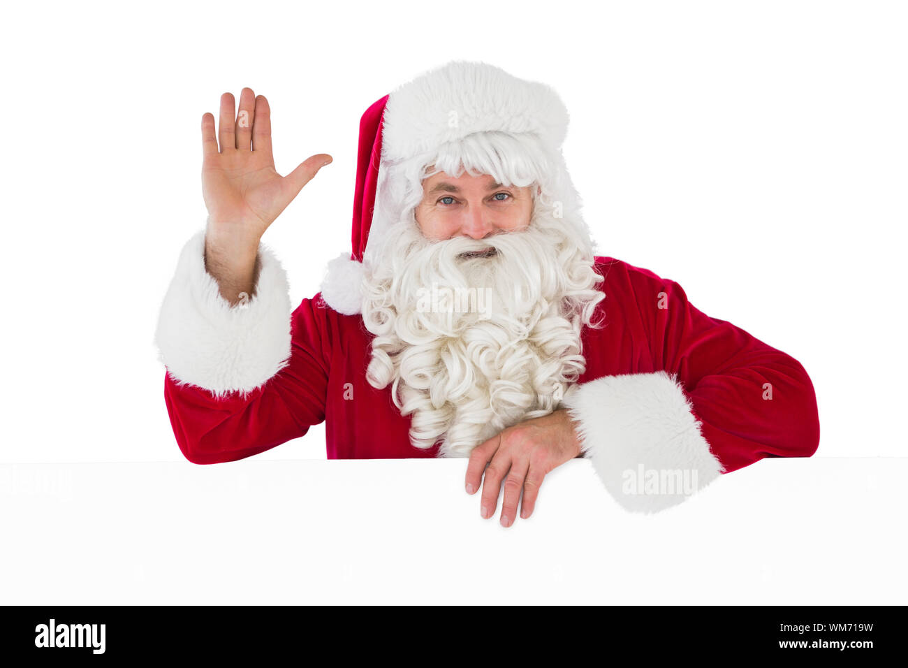 Portrait of santa claus waving on white background Stock Photo - Alamy