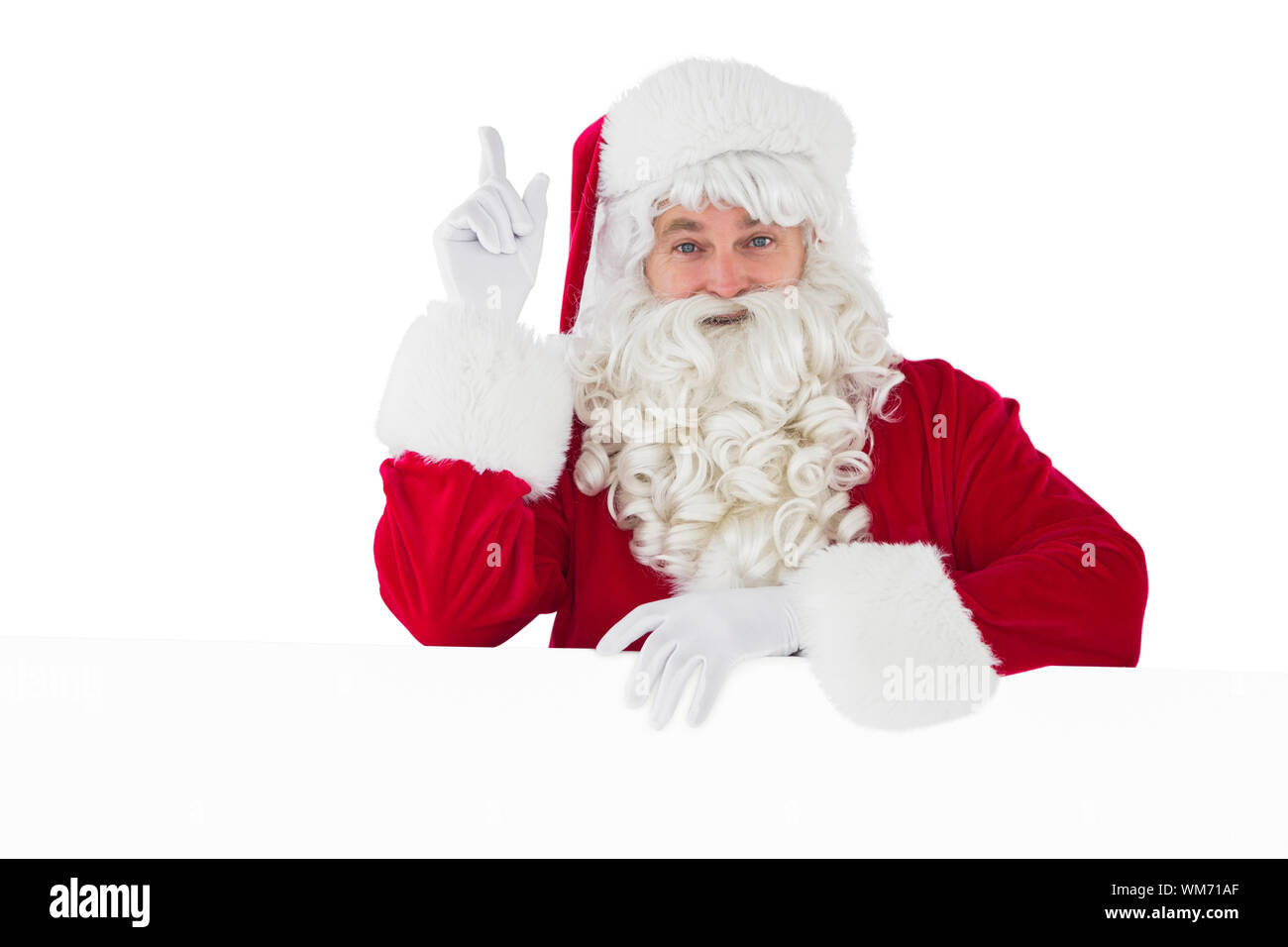 Smiling santa claus doing a gesture on white background Stock Photo - Alamy