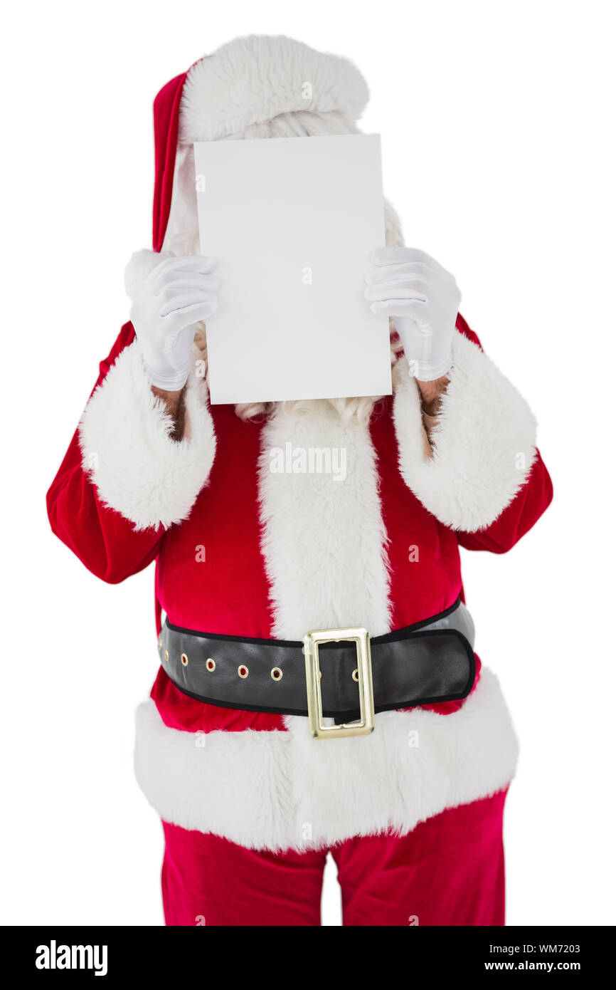 Santa claus presenting card on white background Stock Photo - Alamy