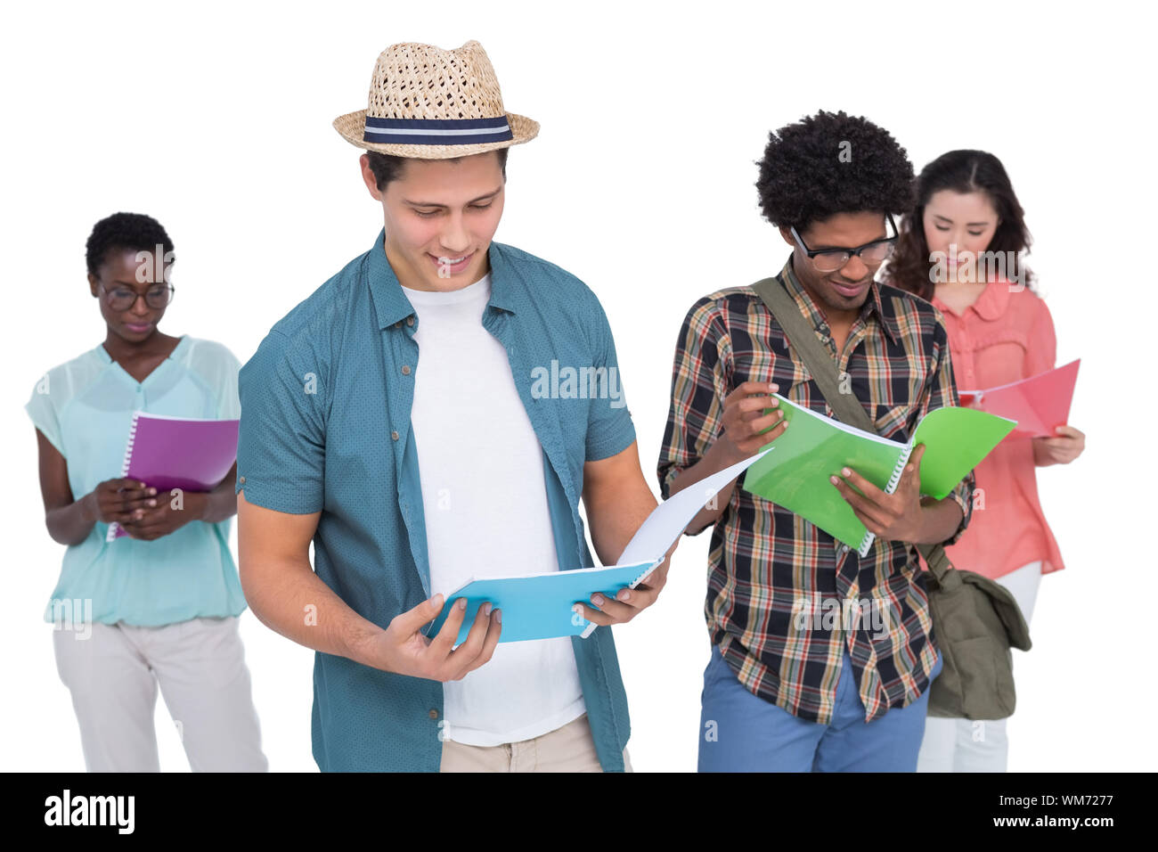 Stylish students smiling at camera together on white background Stock ...