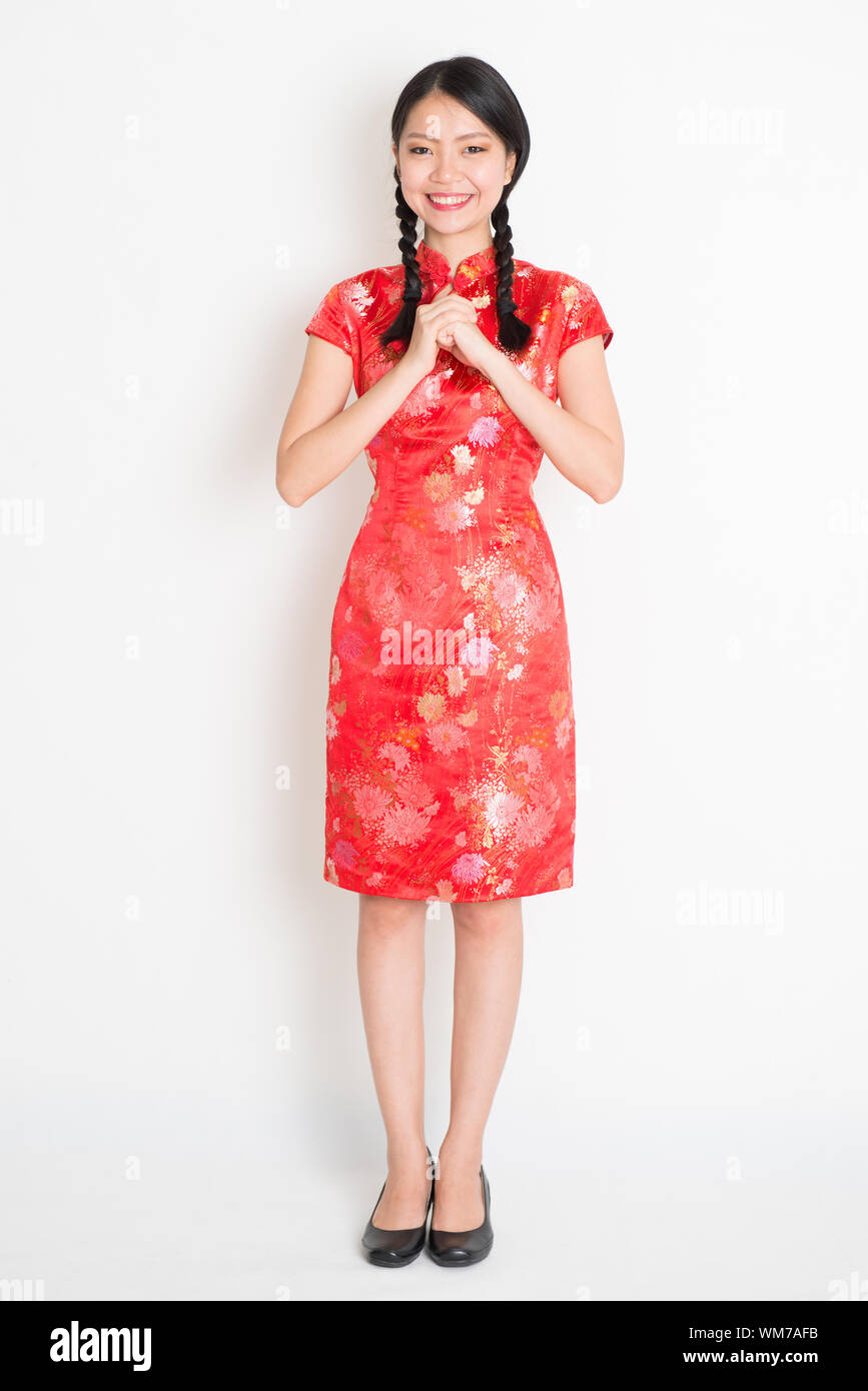 A Portrait of a Chinese Girl in Red Qipao