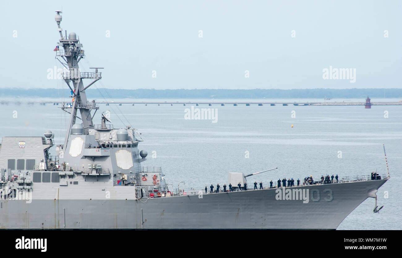 NORFOLK, Va. (Sept. 4, 2019) USS Truxtun (DDG-103) leaves Naval Station Norfolk in preparation of hurricane Dorian. This departure follows the announcement of Sortie Condition Alpha by Commander, U.S. 2nd Fleet. Stock Photo