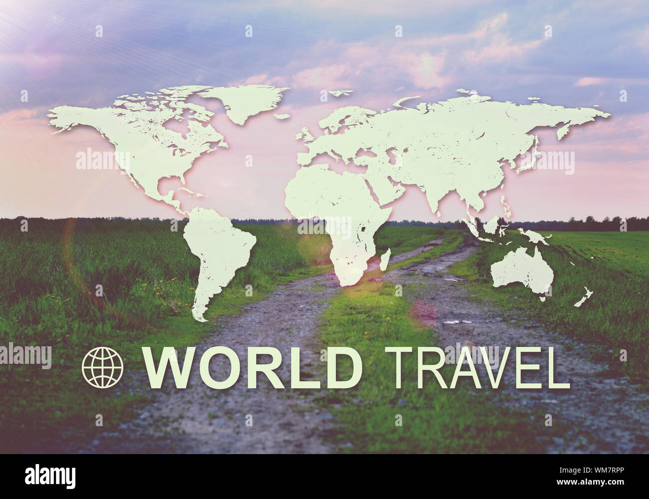 Contoured map of world continents with inscription World Travel. Green meadow at sunrise and country road as  backdrop Stock Photo