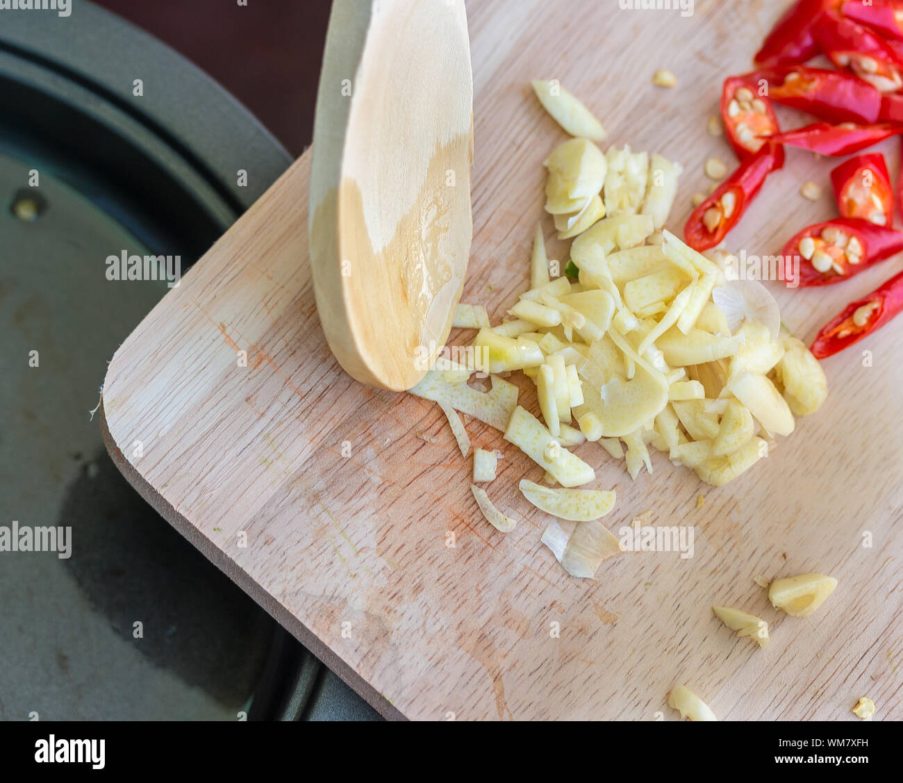 Frying Garlic Indicating Cook Book And Recipes Stock Photo - Alamy