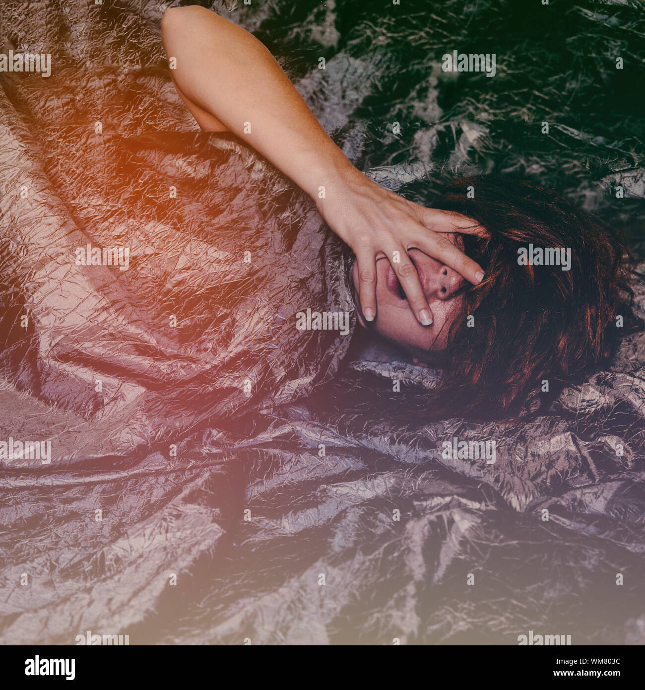 Woman head down bed back hires stock photography and images Alamy