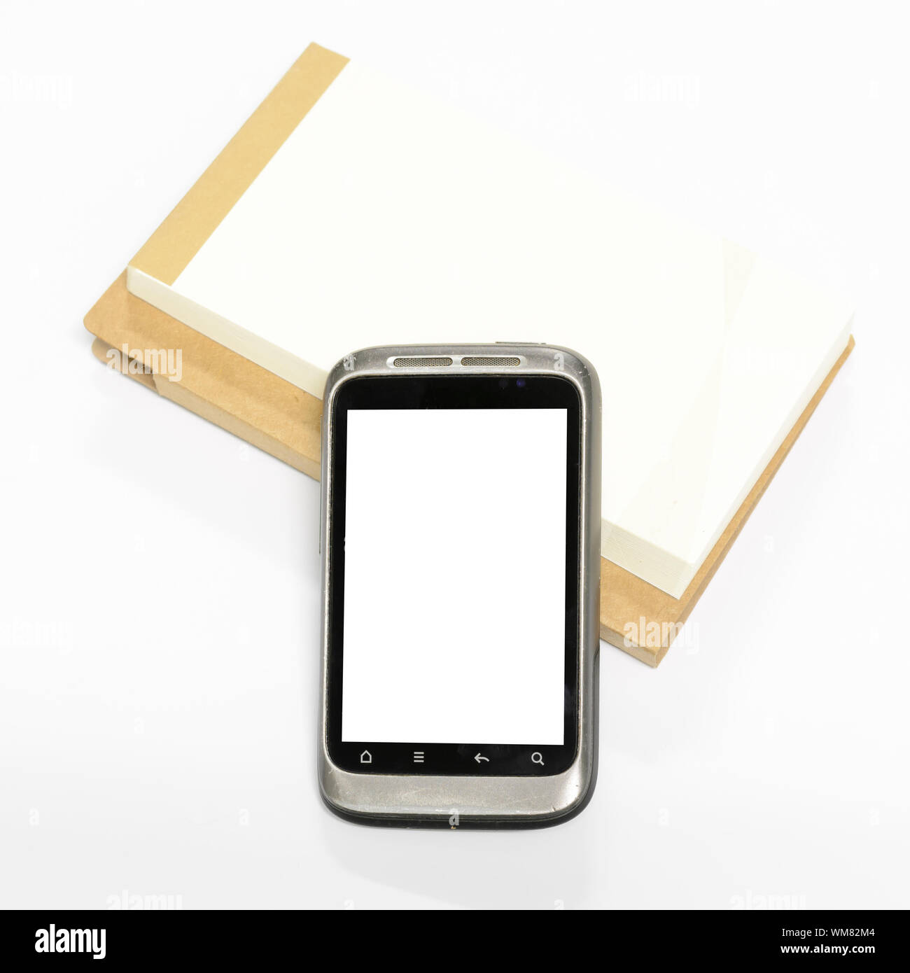 used smartphone with note book Stock Photo - Alamy