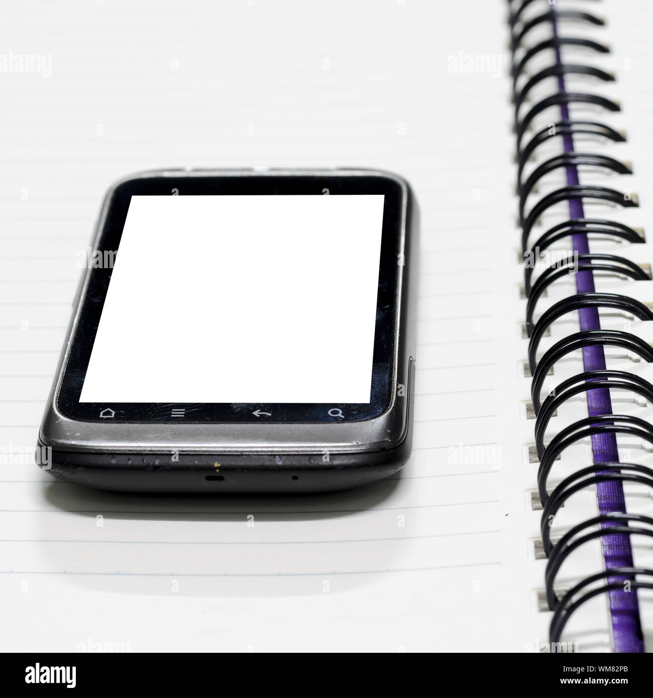 smartphone on note book Stock Photo - Alamy