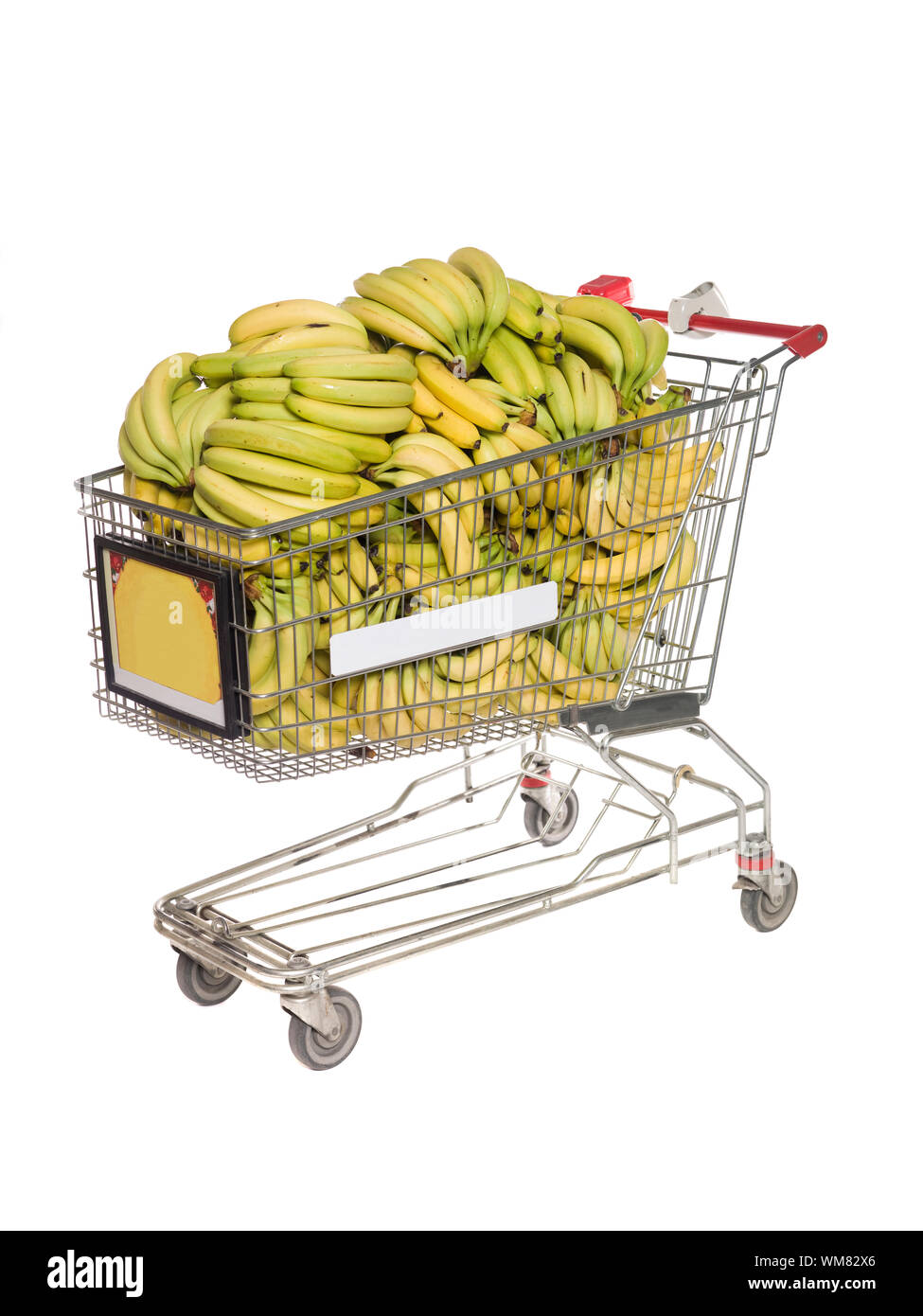 Shopping cart with bananas isolated towards white background Stock