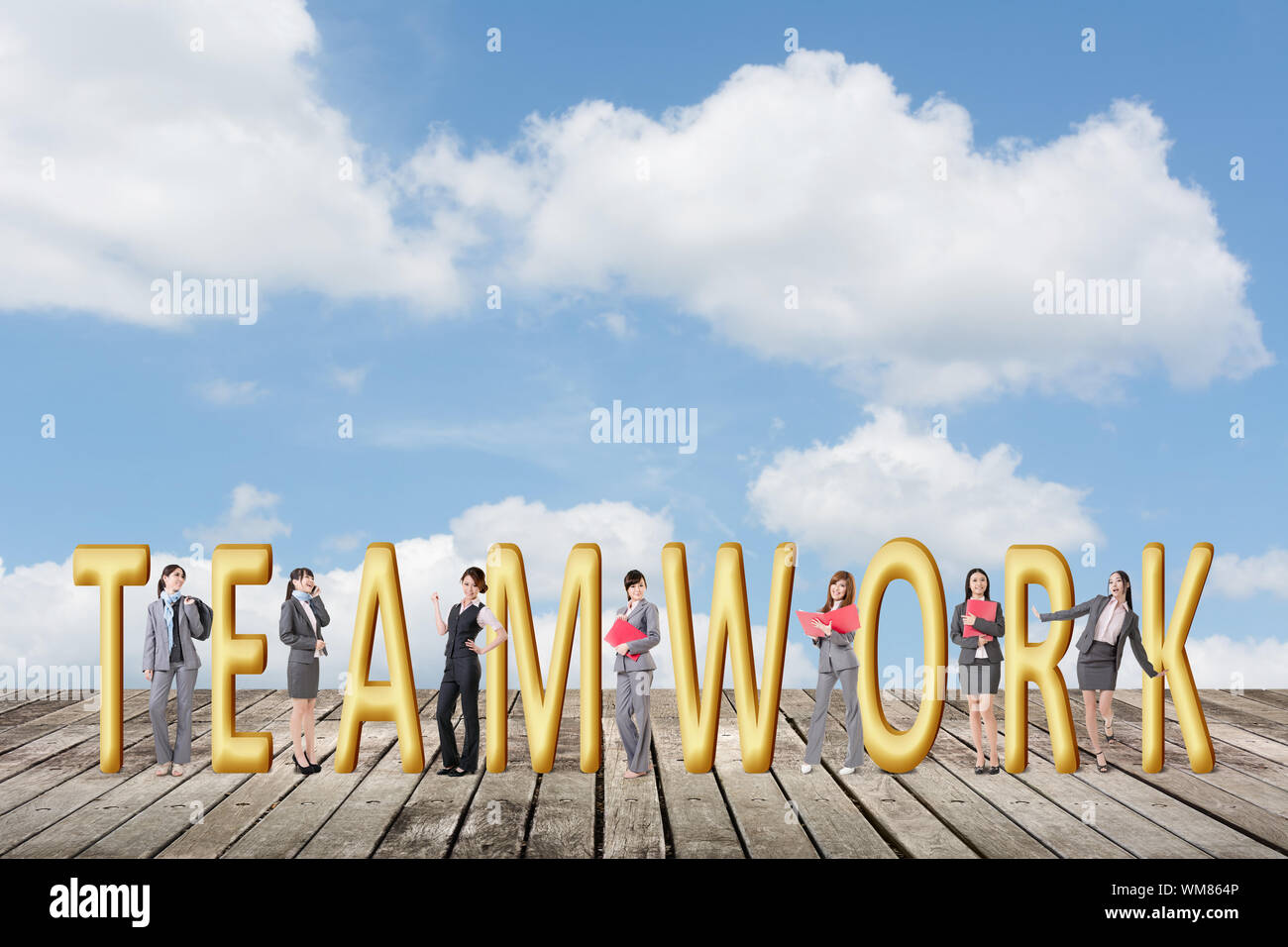 Concept of teamwork with group of business people stand with 3d text. Stock Photo