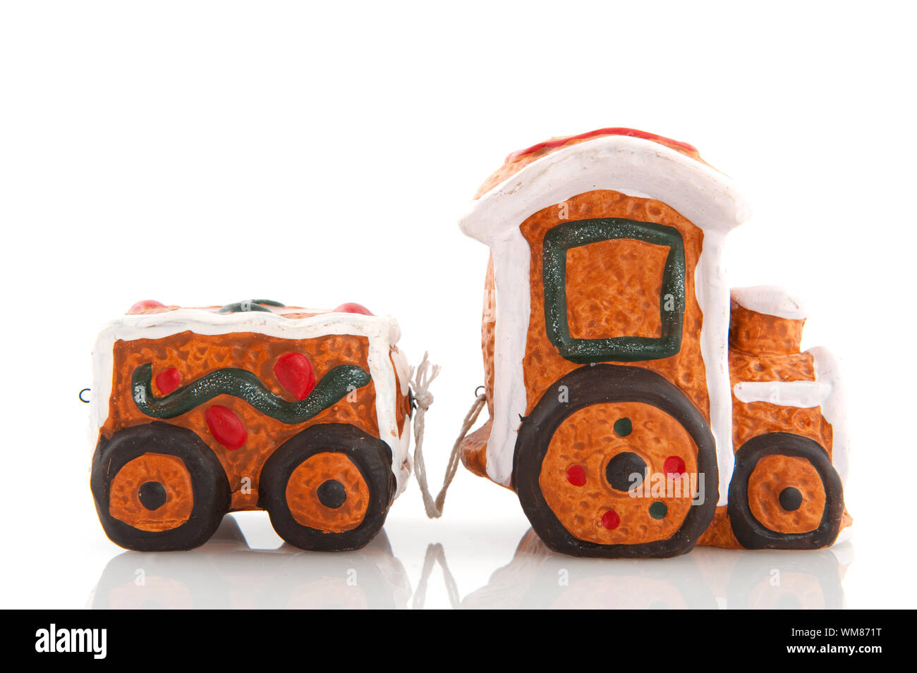 Gingerbread train locomotiv with wagon isolated over white Stock Photo
