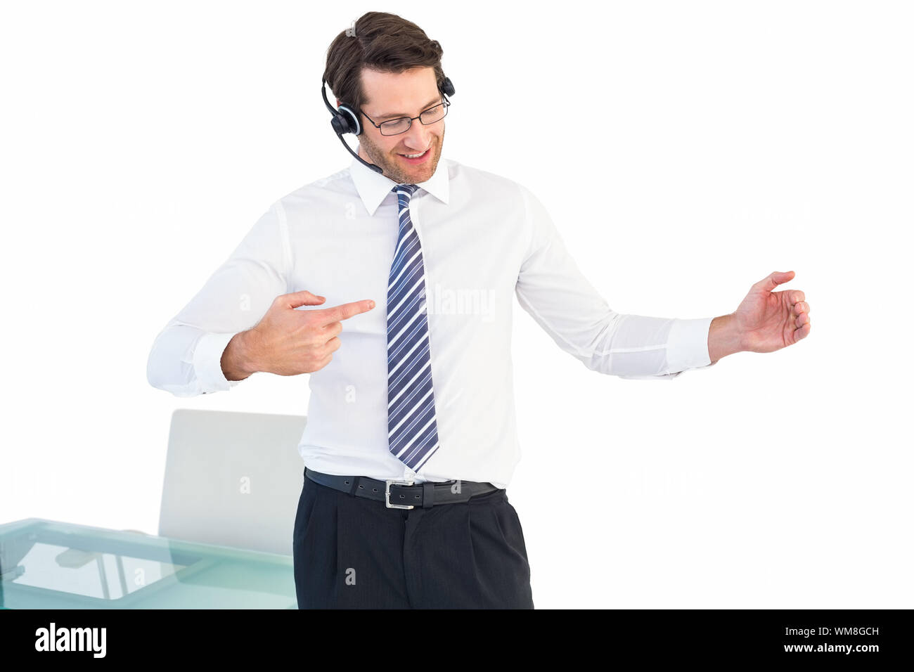 Man Using Something Happy man using microphone presenting hi-res stock photography and ...