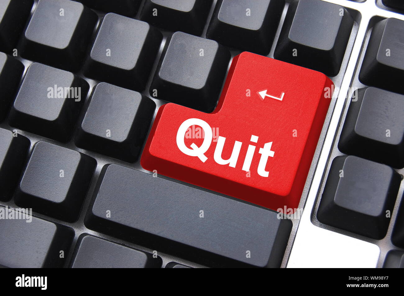 quit button on black internet computer keyboard Stock Photo