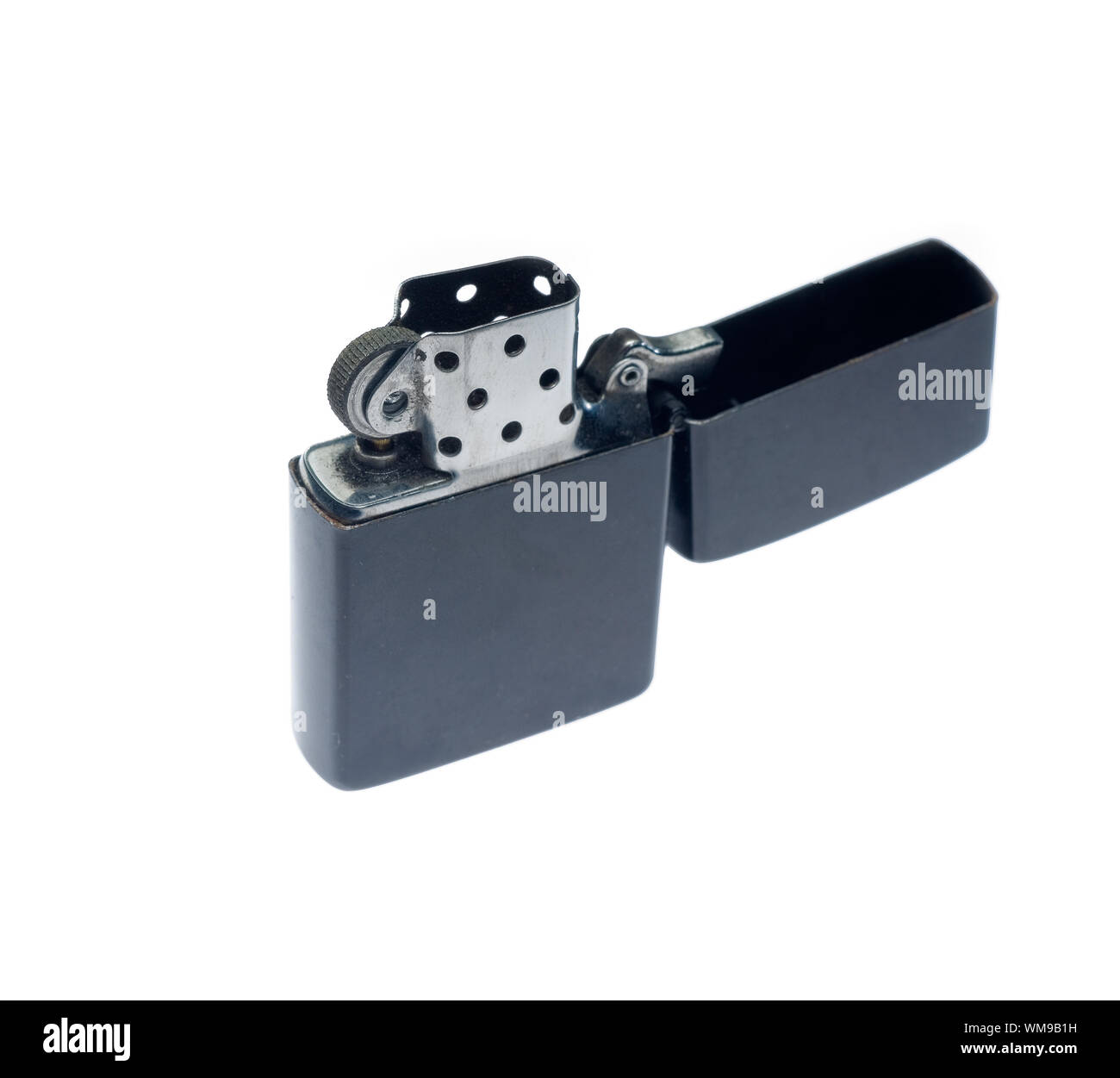 black zippo lighter opened,isolated over white background Stock Photo