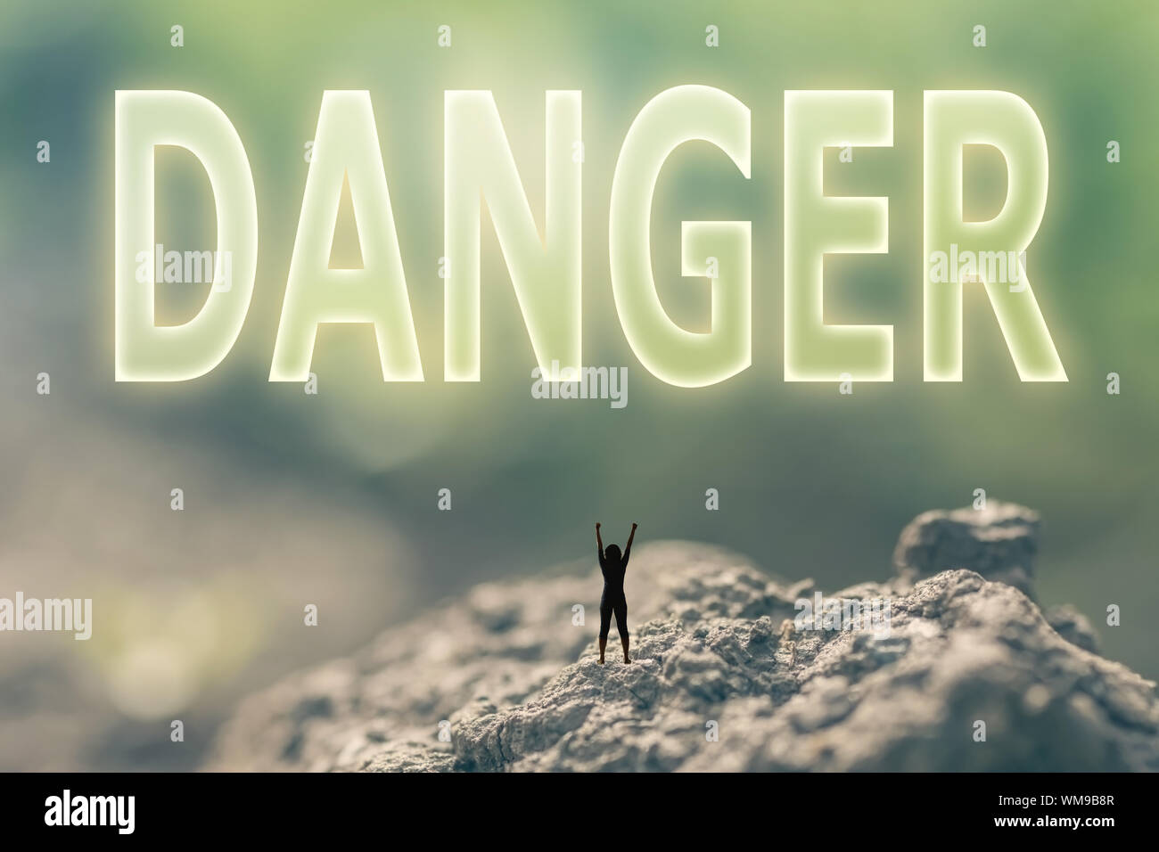Concept of risk with a person stand in the outdoor and looking up the ...