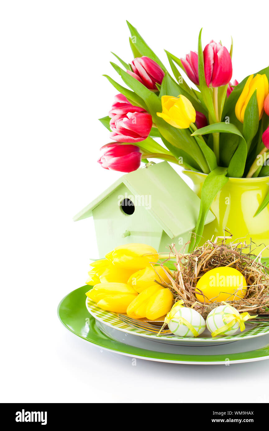 Easter eggs with tulips flowers and birdhouse, on a white background ...