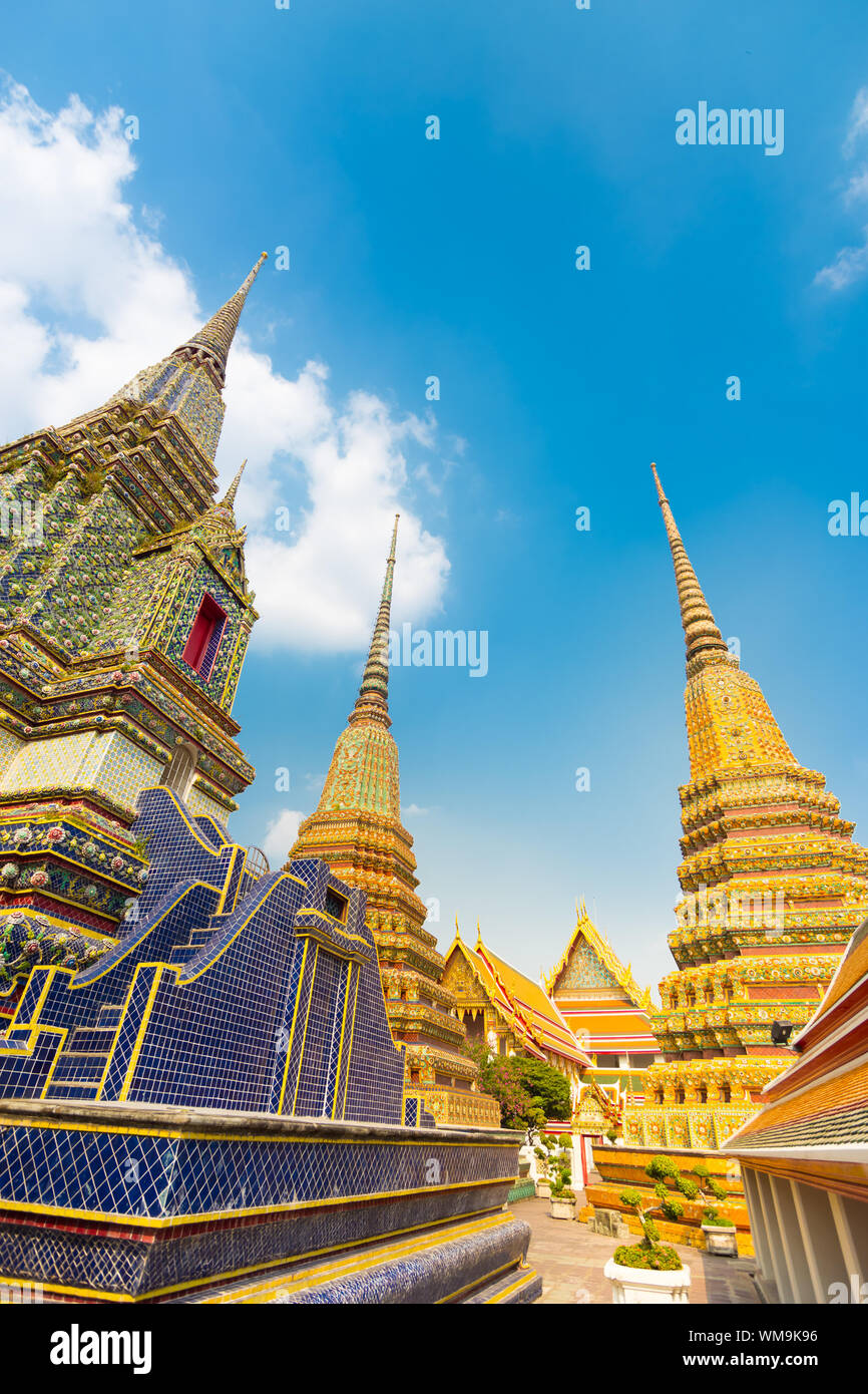 Pagodas of Wat Pho temple in Bangkok, Thailand Stock Photo - Alamy