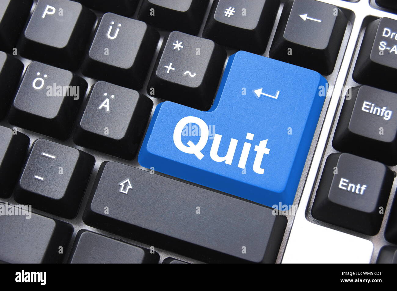 quit button on black internet computer keyboard Stock Photo