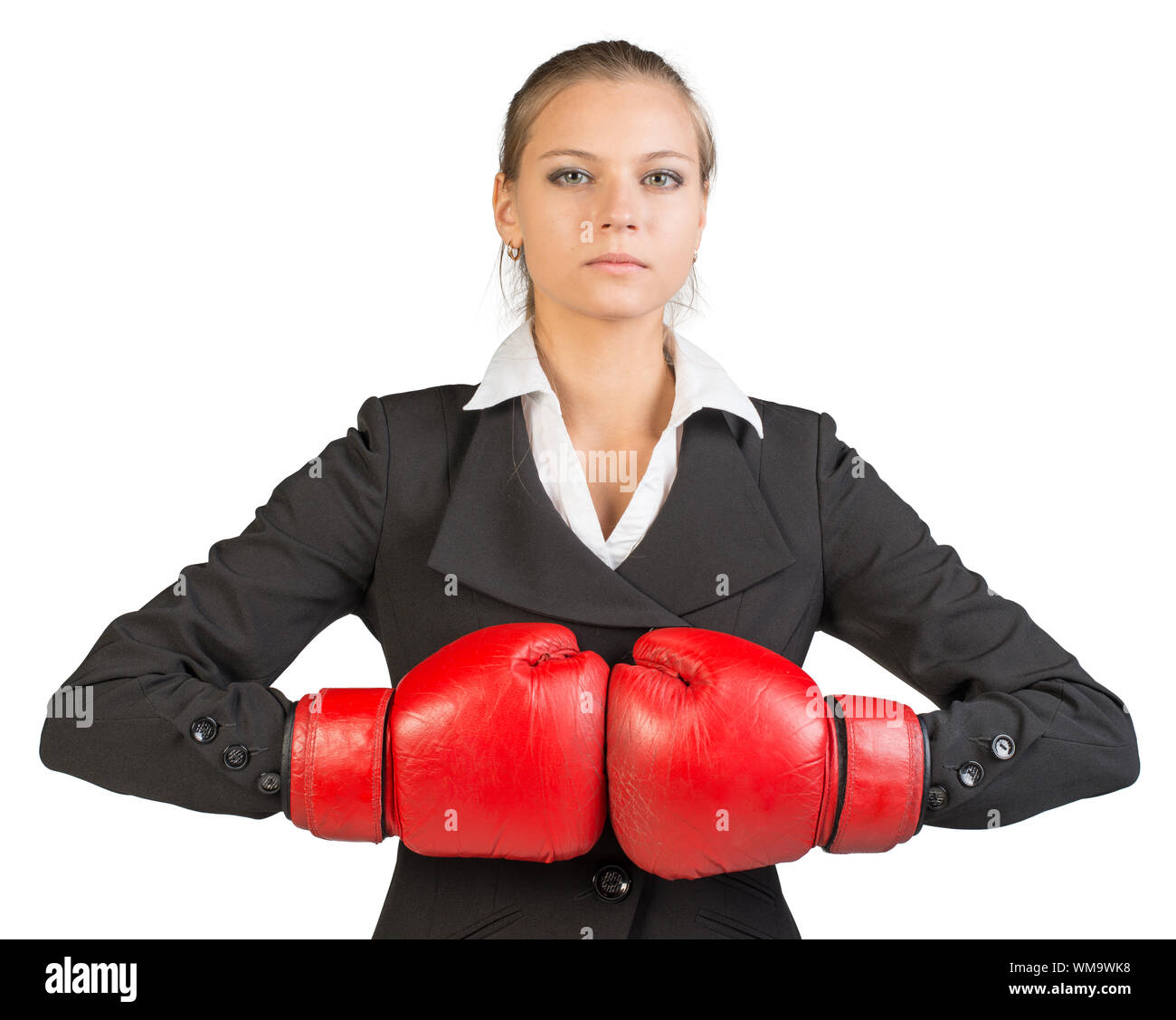 Businesswoman in boxing gloves holding fist to fist. Isolated over