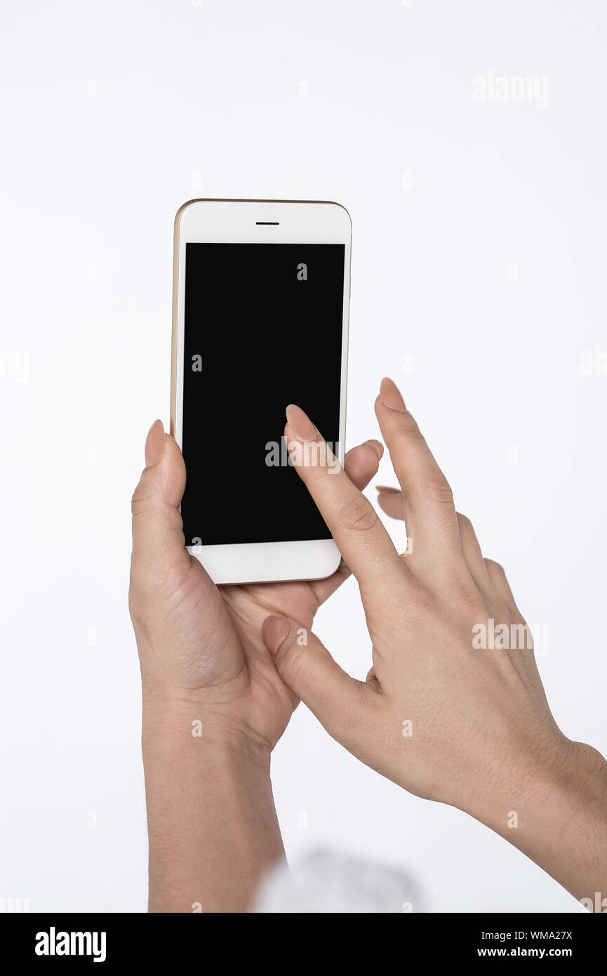 Female hands using mobile phone with black screen Stock Photo - Alamy