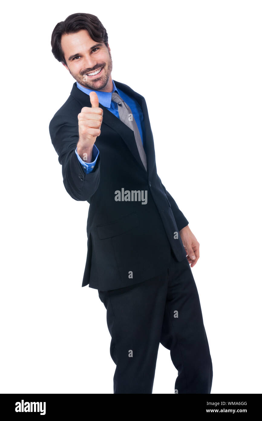 Enthusiastic businessman giving a thumbs up Stock Photo
