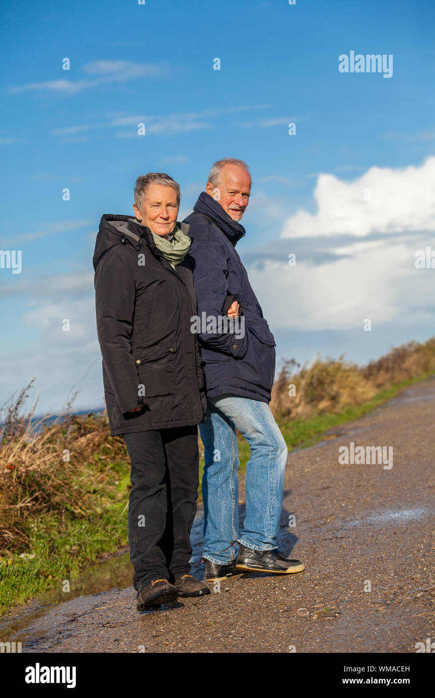 Elderly man walking on beach hi-res stock photography and images - Alamy