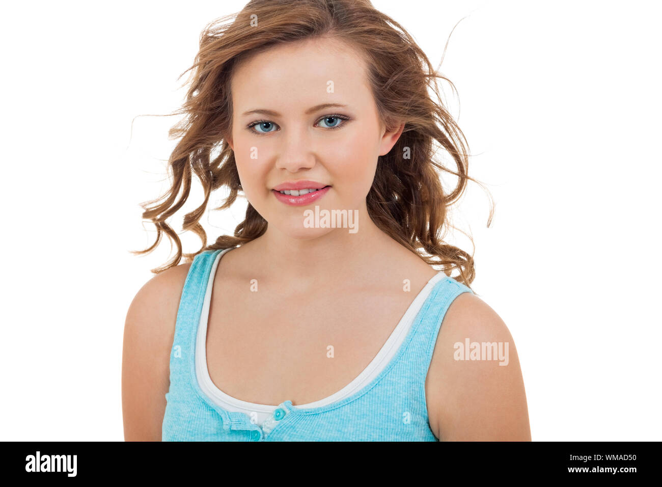 Natural Portrait Of A Pretty Young Woman With Long Tousled Hair