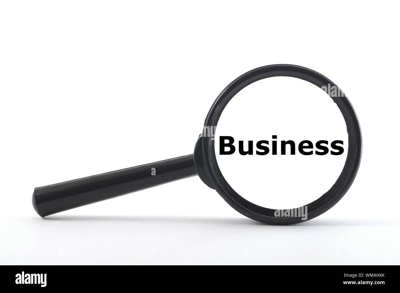 business concept with magnifying glass isolated on white Stock Photo