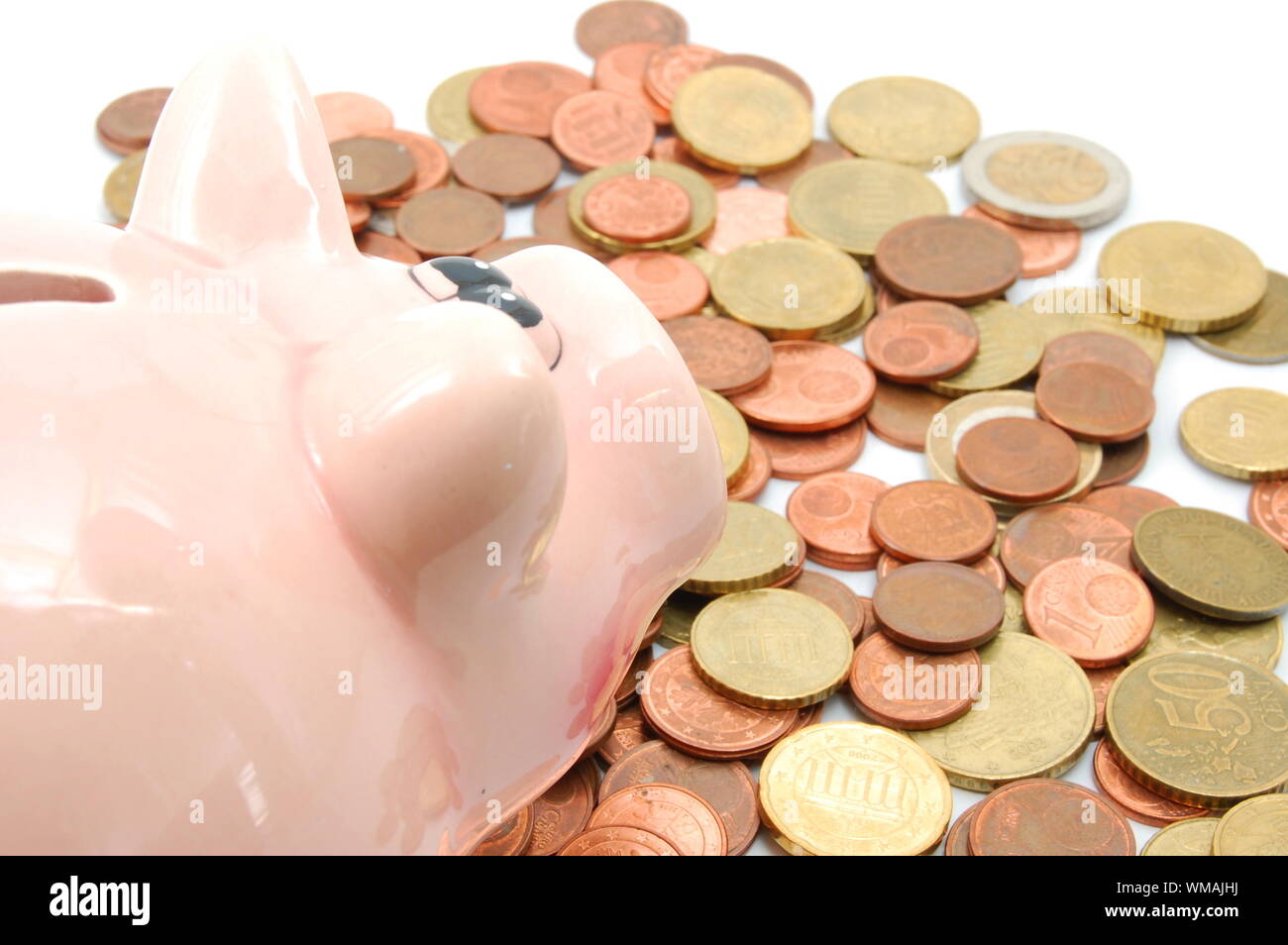 piggy bank and money coins for saving cash Stock Photo - Alamy