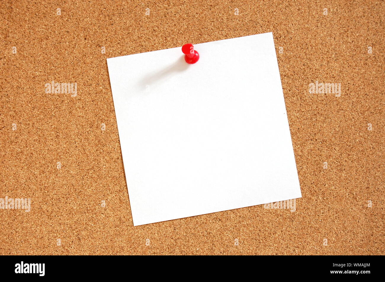 blank sheet paper with copyspace and pin on bulletin board Stock Photo ...