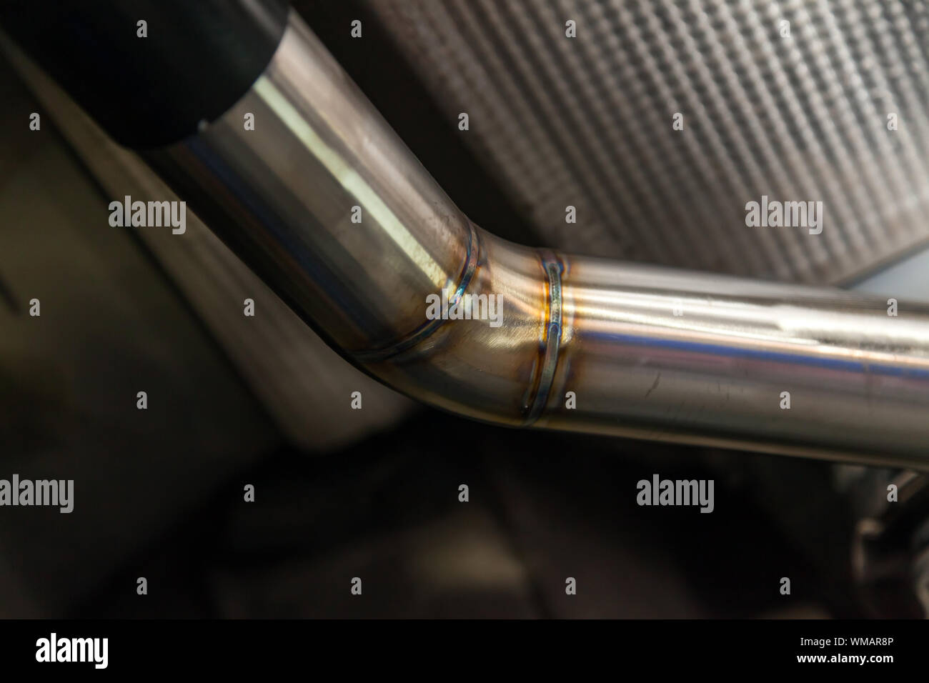 Fabrication and installation of a stainless steel car exhaust pipe with