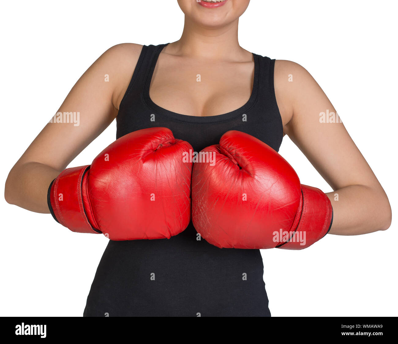 Cropped image of woman in boxing gloves, holding fist to fist. Isolated on white background Stock Photo