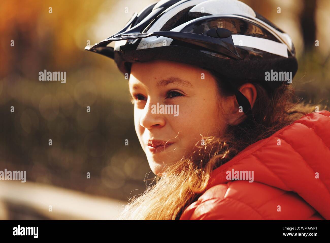 Wearing cycling helmet hi-res stock photography and images - Alamy