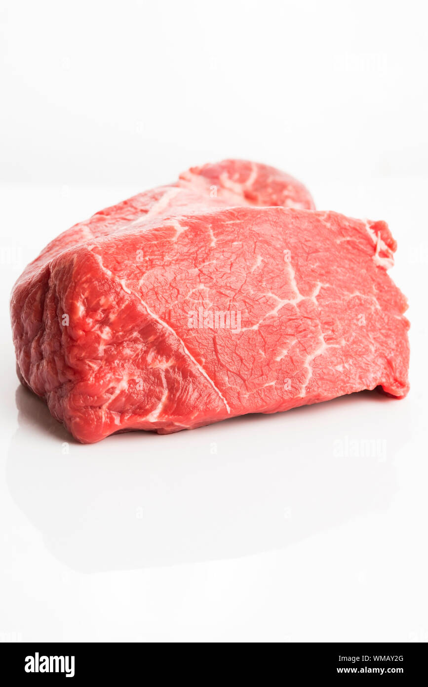 raw beef isolated on white background Stock Photo - Alamy
