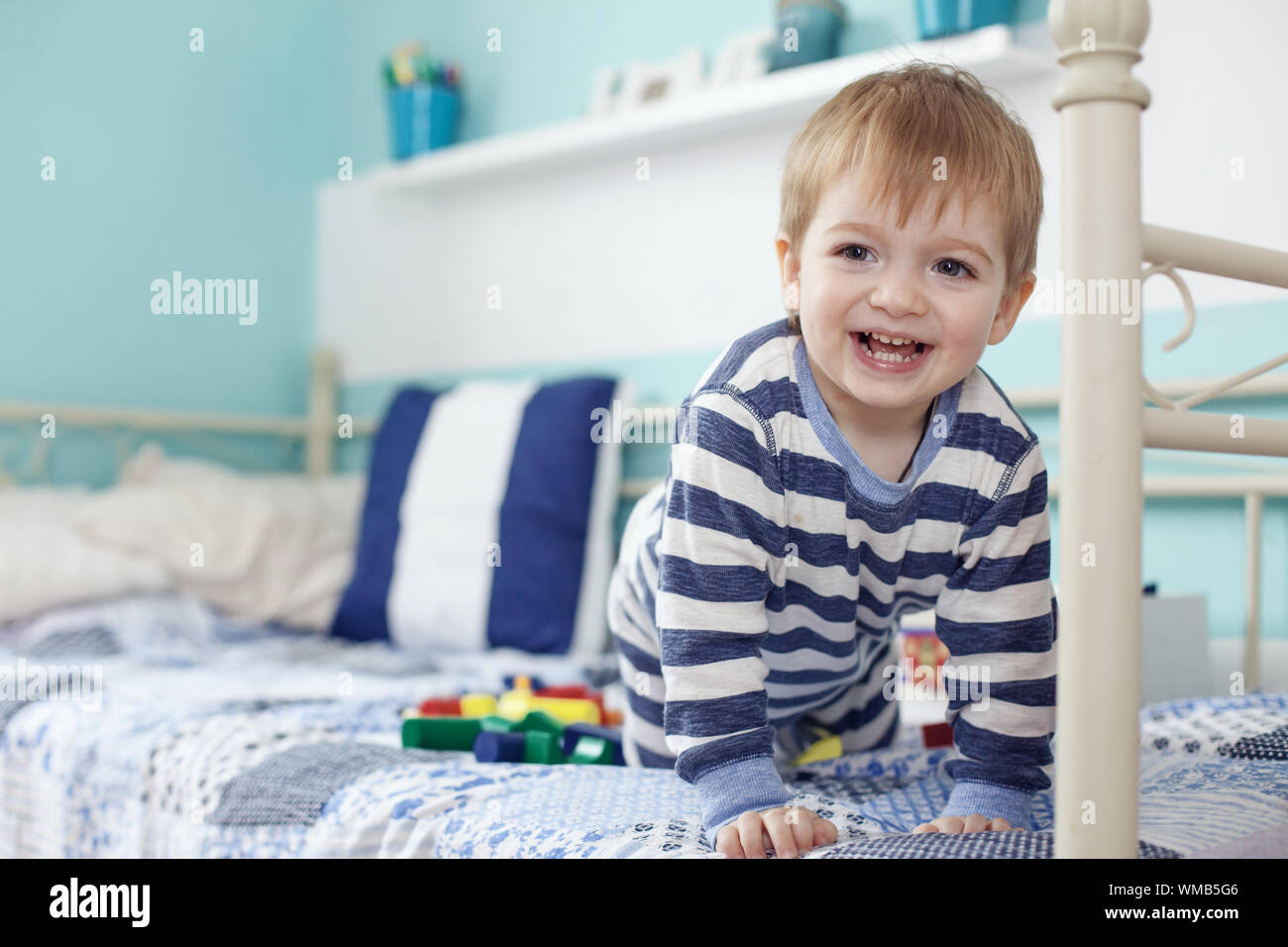 2 Years Old Toddler Playing With Toys At The Bedroom Stock