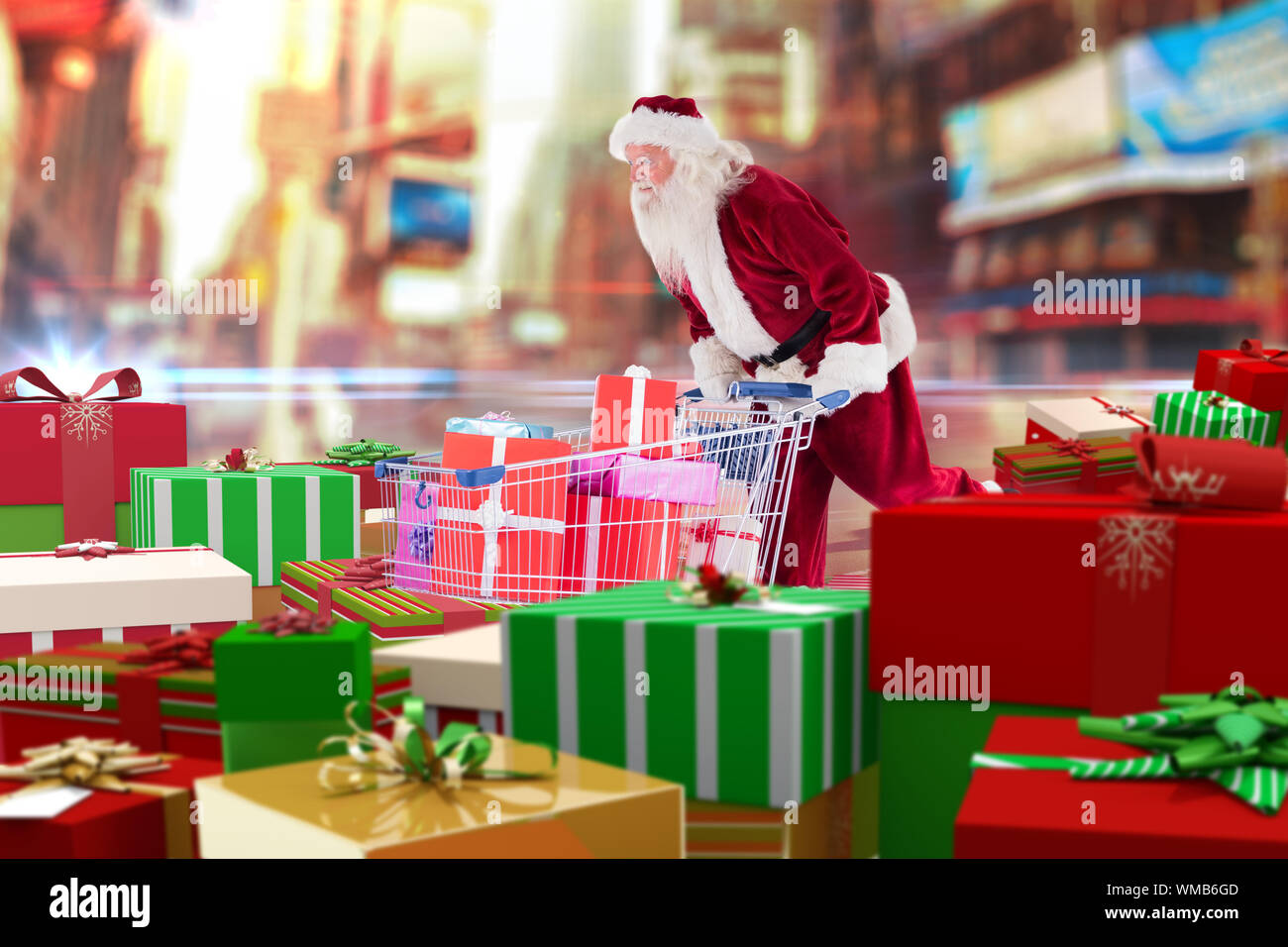 Santa delivering gifts from cart against blurred new york street Stock Photo