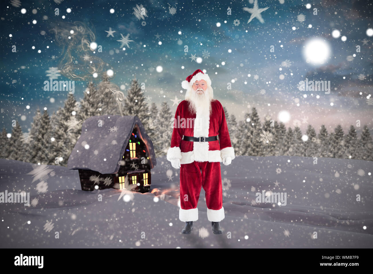 Jolly Santa smiling at camera against christmas house Stock Photo - Alamy