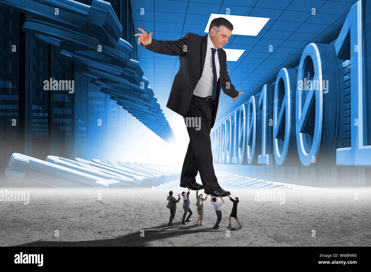 Business people supporting boss against binary code in server room Stock Photo