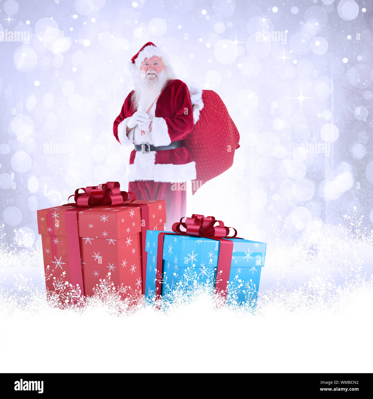 Santa carries his red bag against twinkling white lights Stock Photo ...