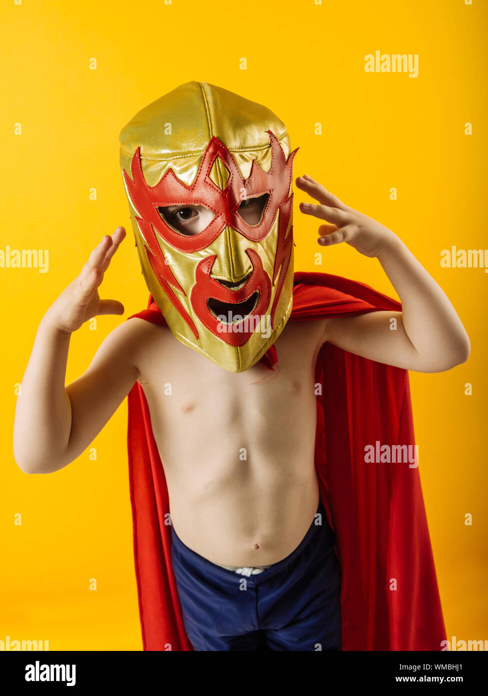 Photograph of a 4 year-old dressed as a Mexican wrestler or Luchador. Stock Photo
