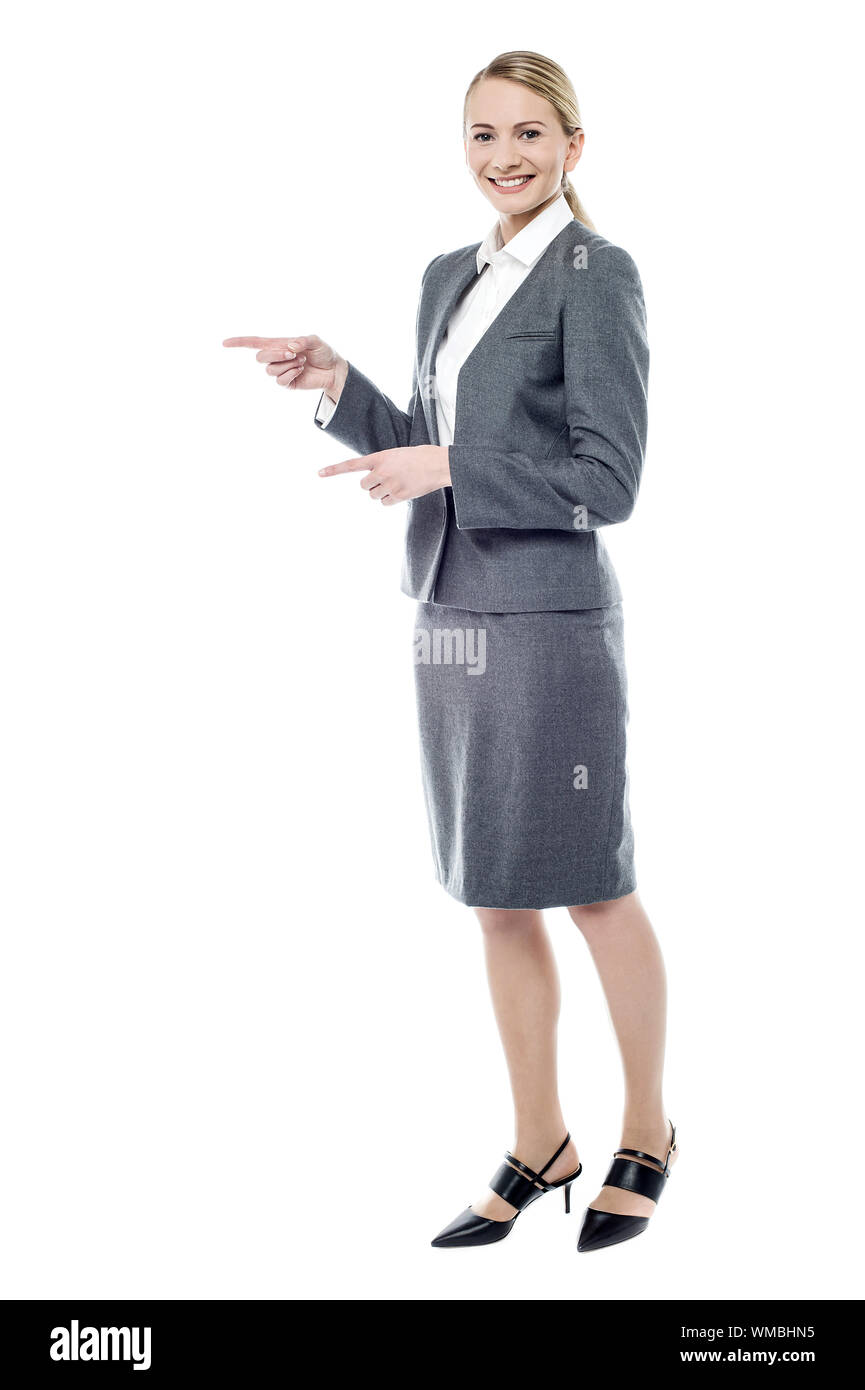 Full length of business executive pointing something Stock Photo - Alamy